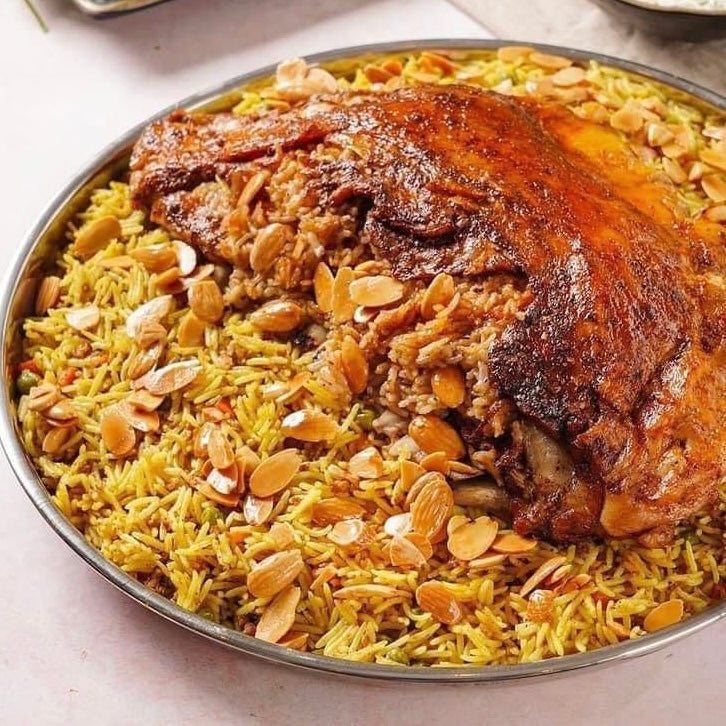 عزيمة Lamb Shoulder & Maftoul with Chicken